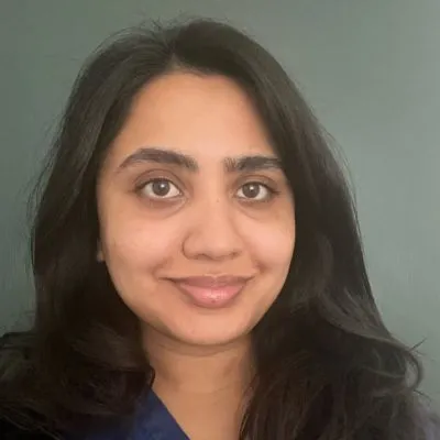 Dr Sonam Haria, Specialist Dental Surgeon performing an oral biopsy in Ely